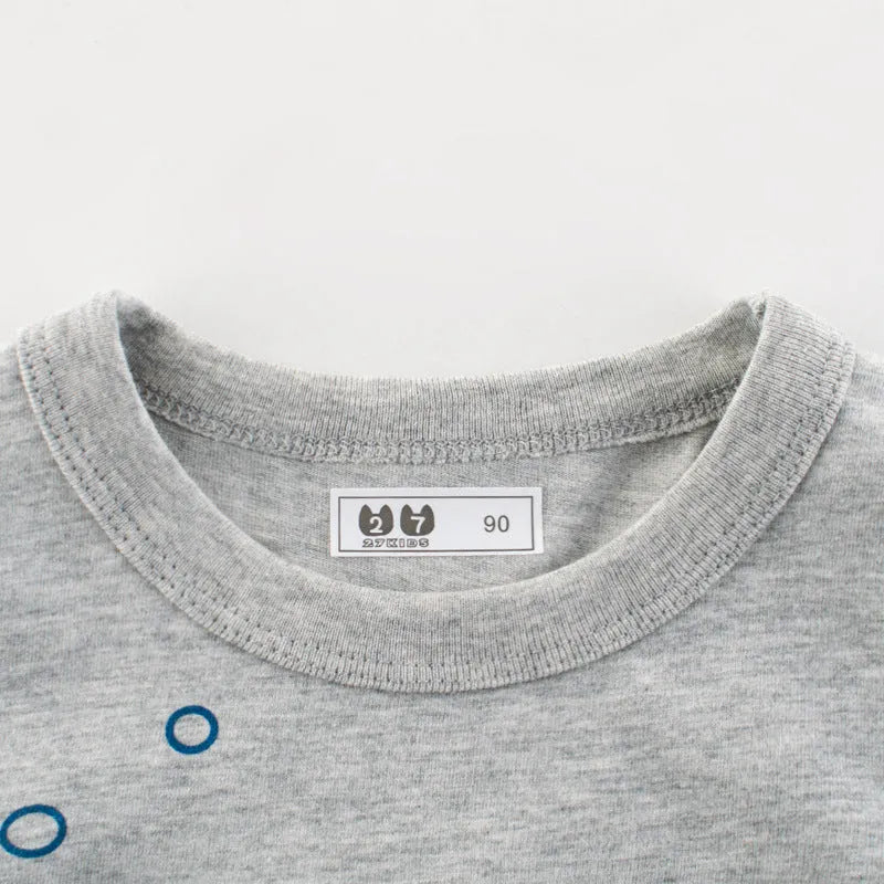 Grey cotton children's t-shirt shown with a size chart listing measurements from 90cm to 140cm.