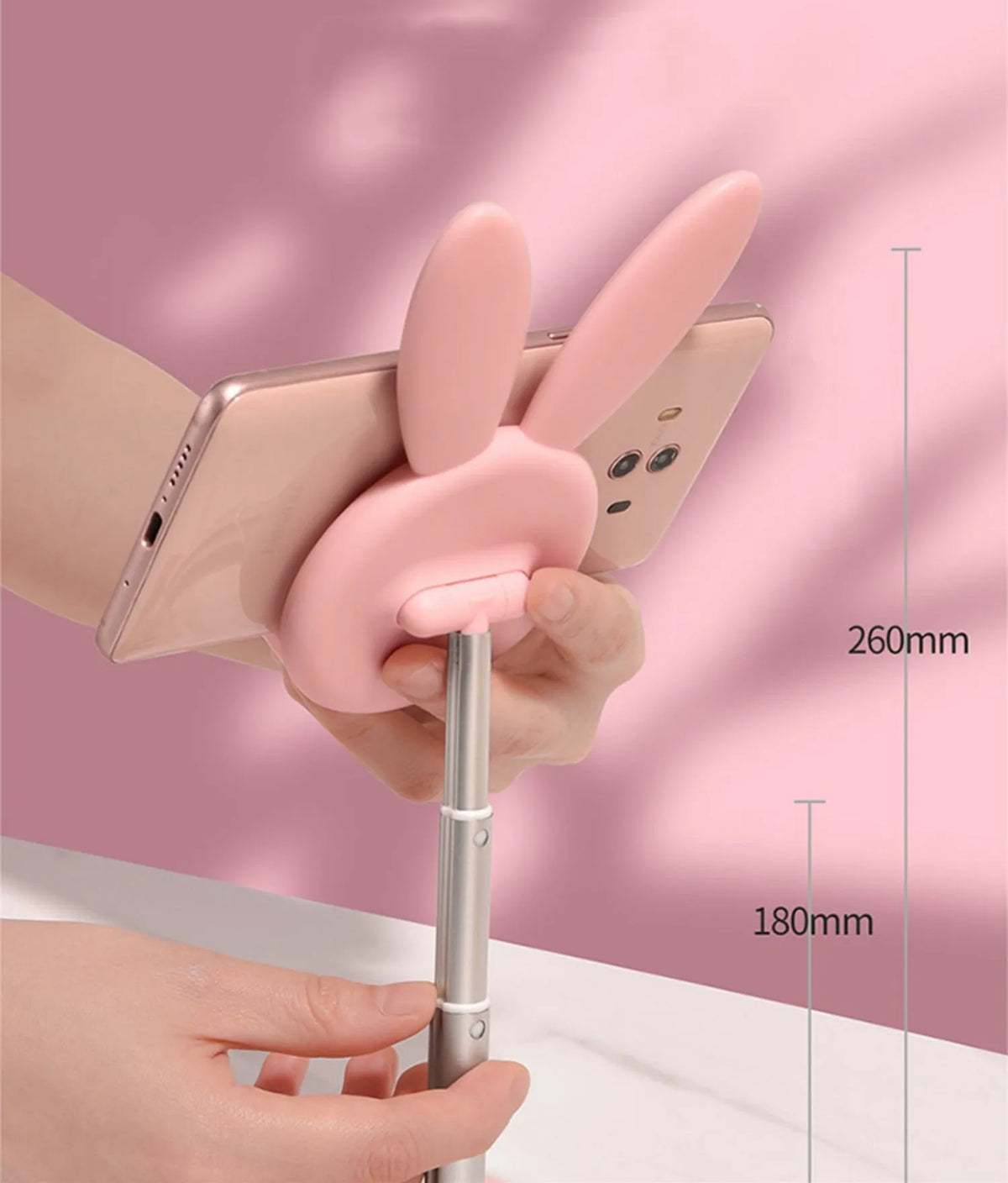 Rabbit-shaped silicone phone stand in pink, green, or white with adjustable scalable desktop holder