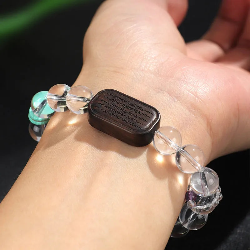 Natural white crystal ebony five bead ethnic bracelet with adjustable fastening