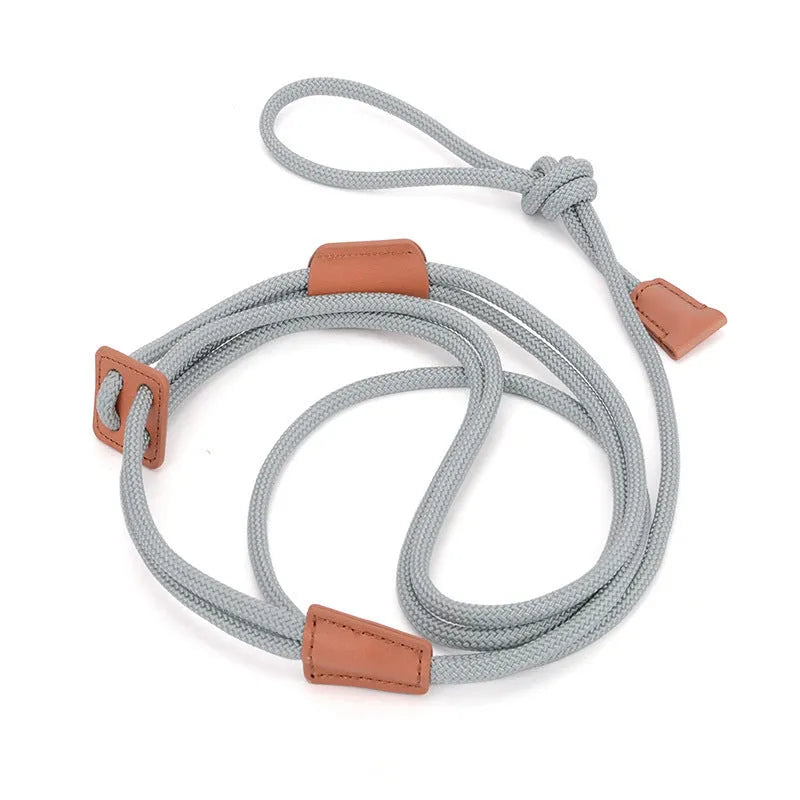 Chest-back dog leash in monochrome design, 143cm long, made from synthetic silk nylon rope and cowhide, in grey.