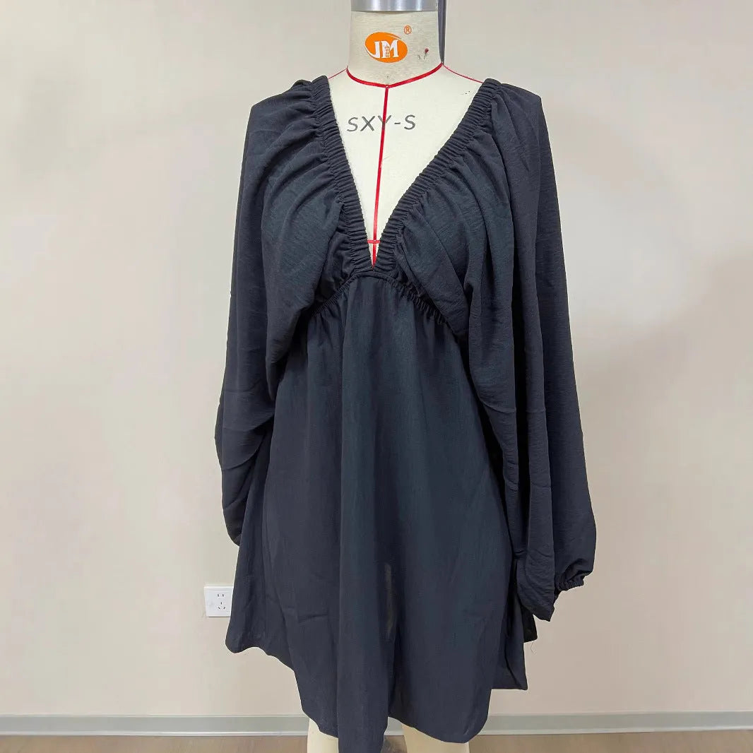 Women's V-neck dress with puff sleeves and flounced swing skirt in polyester fabric