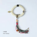White Bodhi seed bracelet and handheld mala with 3x10mm beads on a neutral background.
