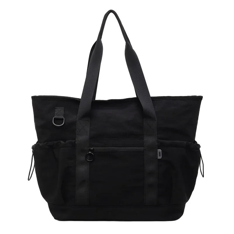 Women's lightweight Oxford cloth travel bag for yoga and fitness in grey colour with letter pattern.