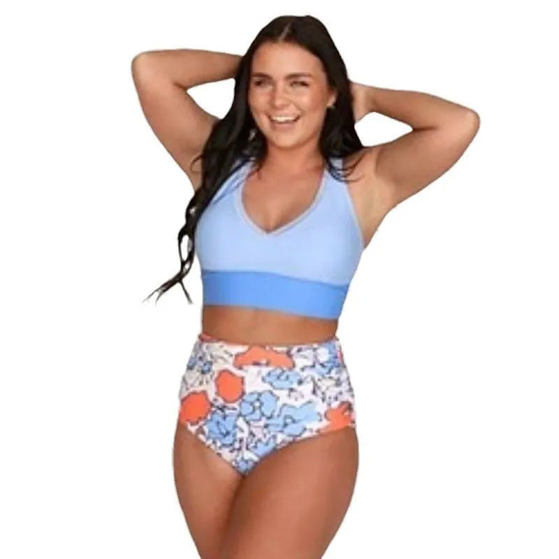 Women's conservative blue polyester one piece split swimsuit with vest top and full coverage