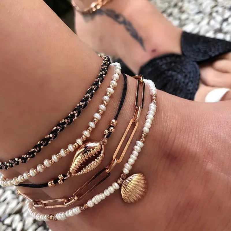 Five-piece gold tone anklet set with braided, shell and geometric ethnic style anklets for women