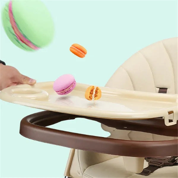 Sky blue portable baby chair for toddlers on a wooden floor.