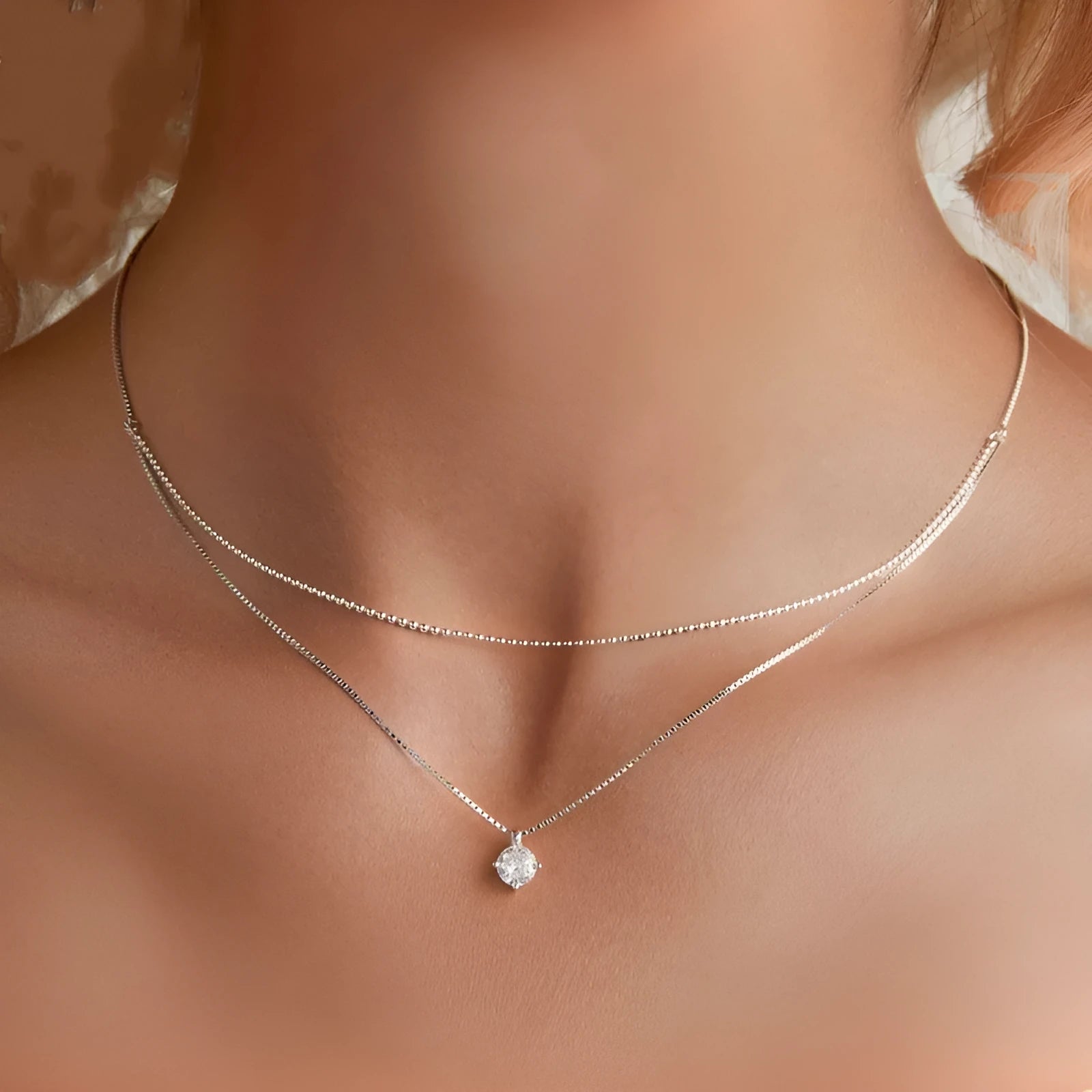 Double-layer sterling silver necklace with pearl chain and silver pendant