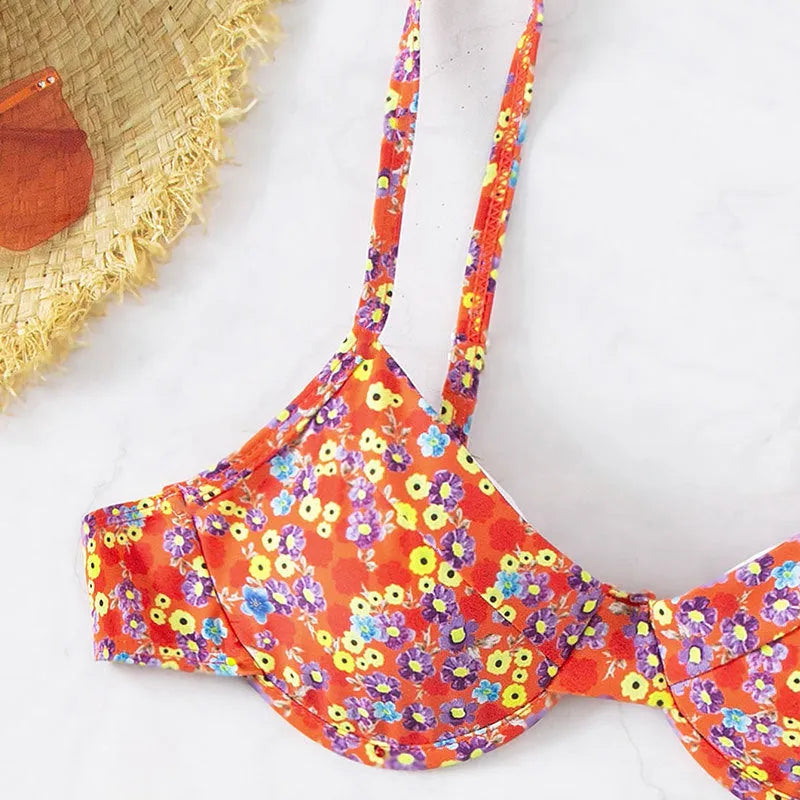 Red floral high waist split swimsuit for women on a white background.