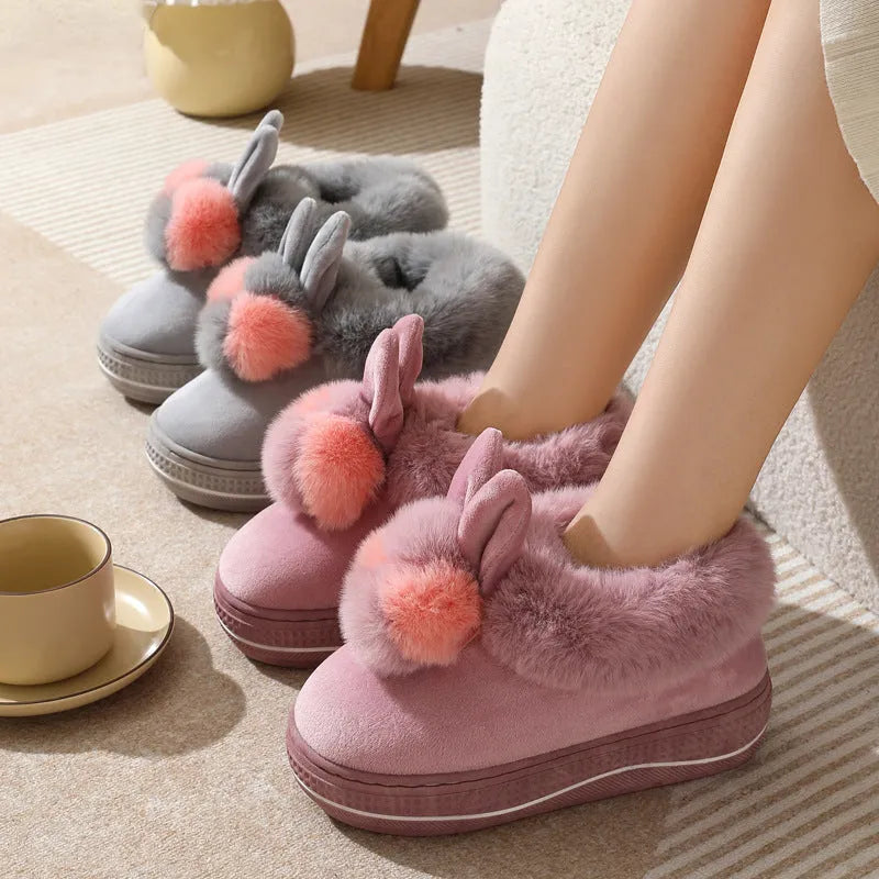 Women's grey plush high-heel winter slippers with a thick, anti-slip TPR sole.