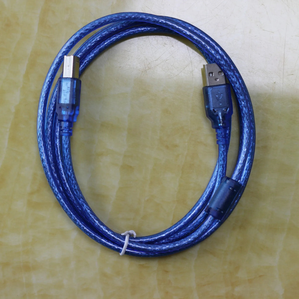 Black USB OTG cable with Mini USB and TYPE-C connectors on white background