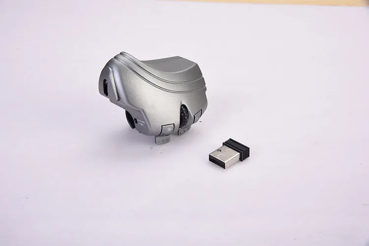 Rechargeable Bluetooth 2.4G wireless ring mouse on a finger, black colour, compact size 60x40mm