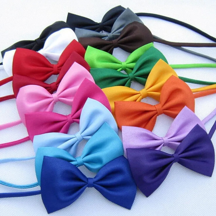 Adjustable dog and cat bow tie neck tie in 17 colours including black, red, blue, green, pink, and yellow