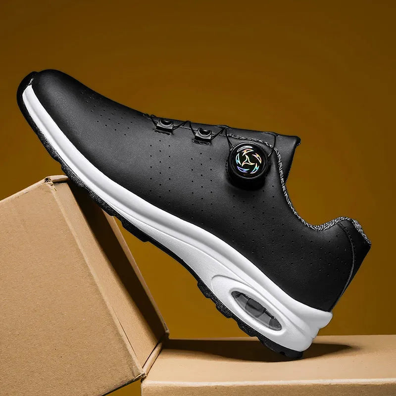 Men's black and white low-top casual tennis shoes with mesh upper and cross shoulder straps