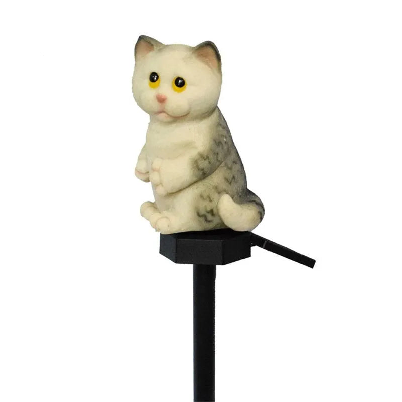 Brown resin cat-shaped solar garden light for outdoor decorative lighting.