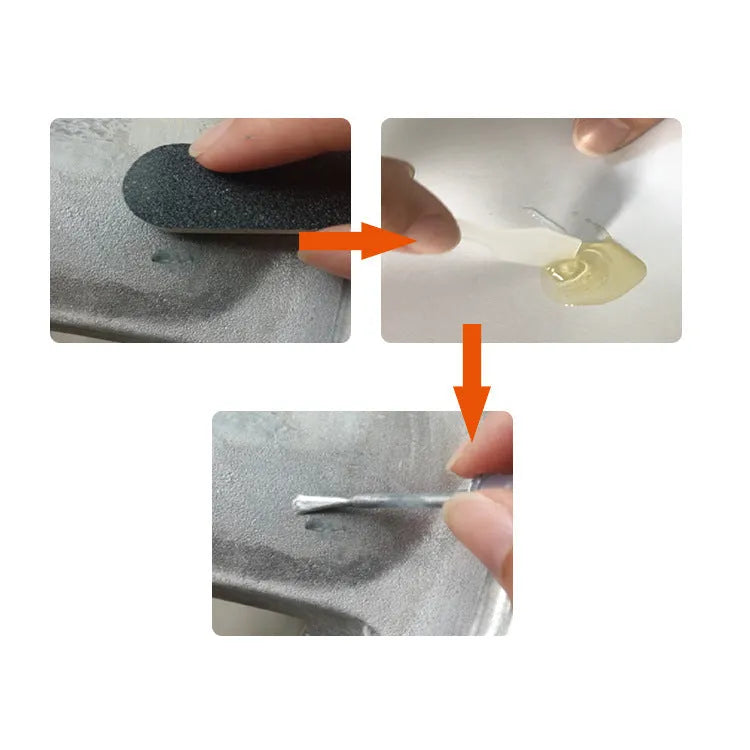 Alloy wheel repair kit with glue, paint, sanding file, gloves, spatulas and brushes on workbench