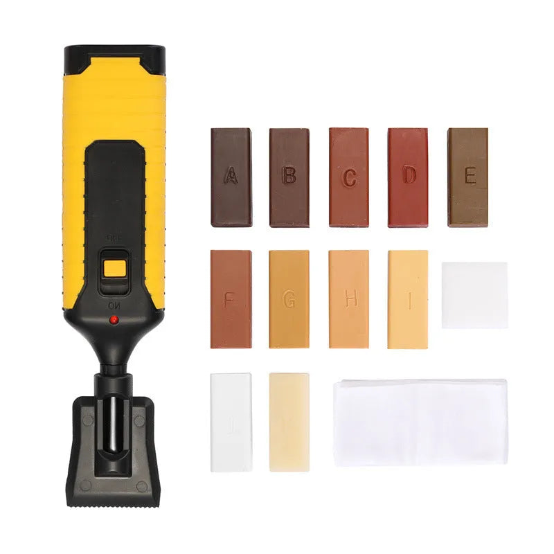 Red and yellow handle floor repair tool with wax colour sticks for DIY tile restoration