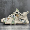 Men's beige casual platform lace-up pumps with embroidery details on a round toe and thick rubber sole.