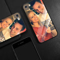Patterned ultra-thin iPhone case with raised edges protecting the screen and camera lens.