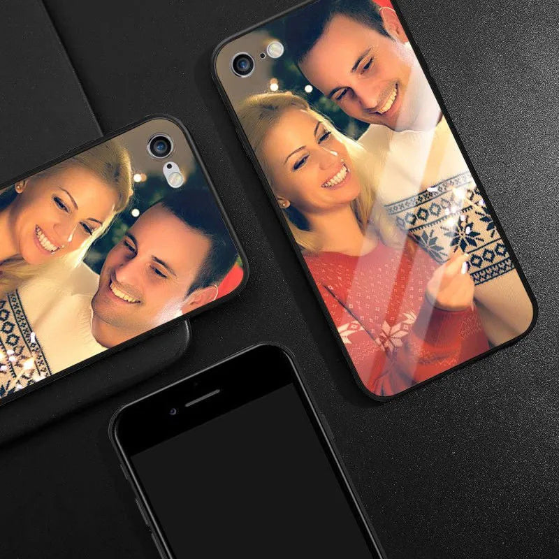 Patterned ultra-thin iPhone case with raised edges protecting the screen and camera lens.