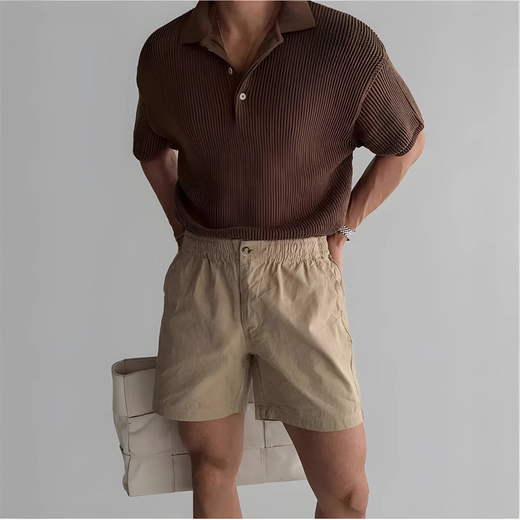 Men's loose cotton sports shorts in black colour showing athletic design for summer wear