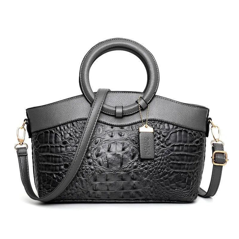 Fabric casual handbag for women showing multiple compartments and available in six colours including black, brown and red