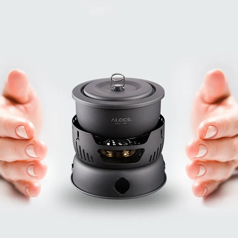 Alocs CW-K26 aluminium non-stick outdoor camping pot set stacked on a wooden table.