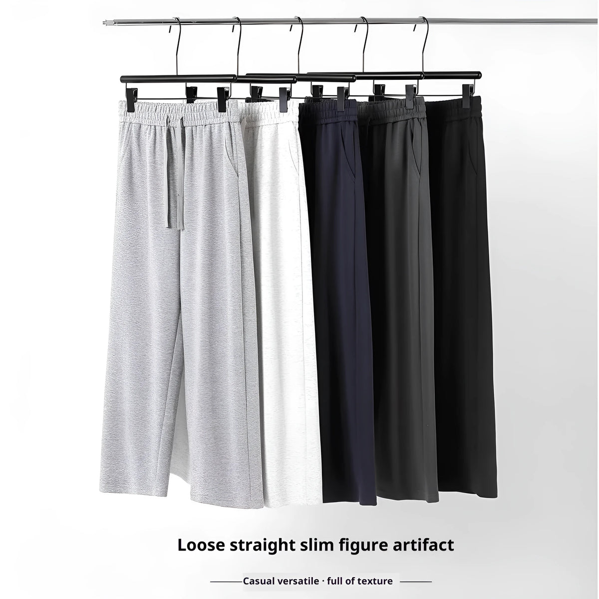 High-waisted straight-leg cotton trousers in loose fit, shown in available colours, sizes M to 3XL