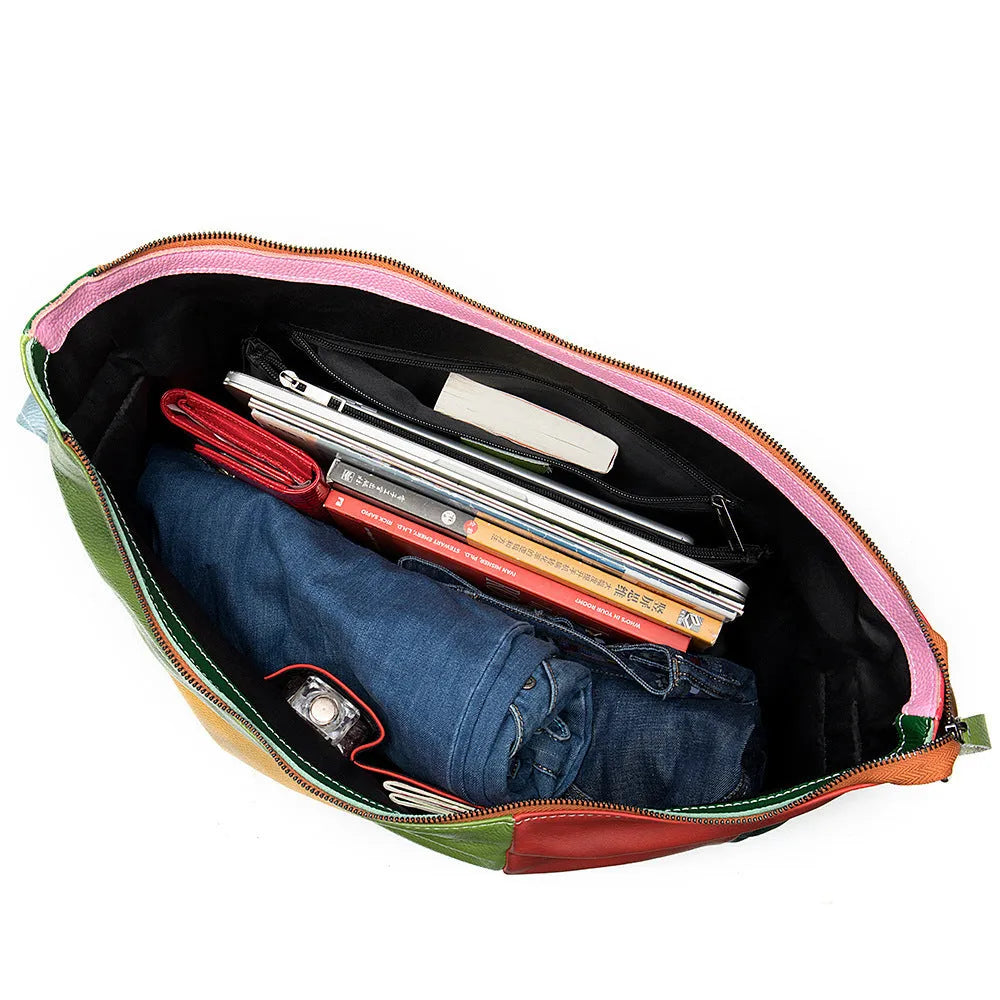 Cowhide leather travel shoulder bag in picture colour, shown with dimensions for laptop and A4 document carry.