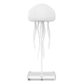 Jellyfish mood lamp with LED lights and adjustable tentacles on desk
