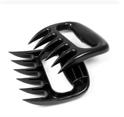 Two black bear claw meat shredder forks with patterned handles for barbecue use.