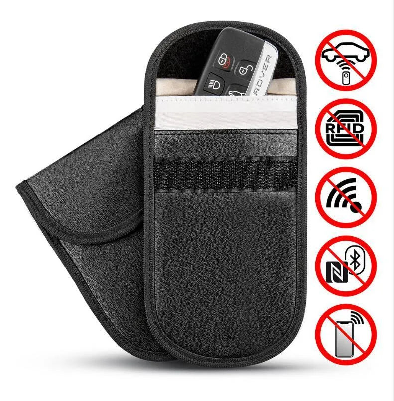 Black microfiber Faraday cage key fob bag for blocking mobile phone signals and RFID scanning