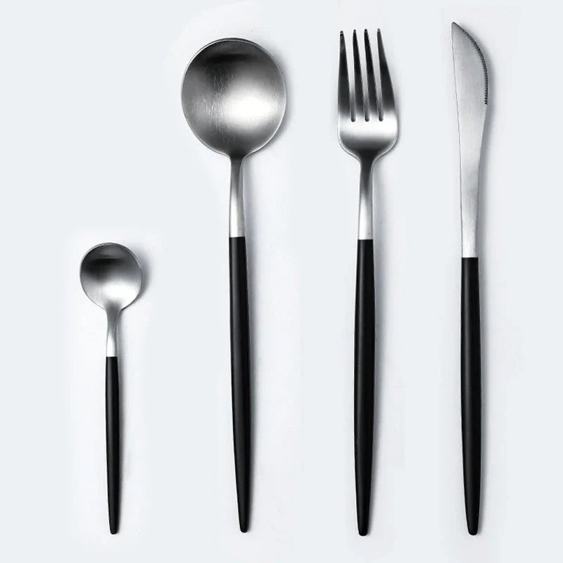 Premium stainless steel cutlery set with a mirror-polished finish, including coffee spoons, dessert spoons, main meal spoons, dessert forks, main forks, and chopsticks, presented in a stylish gift box.