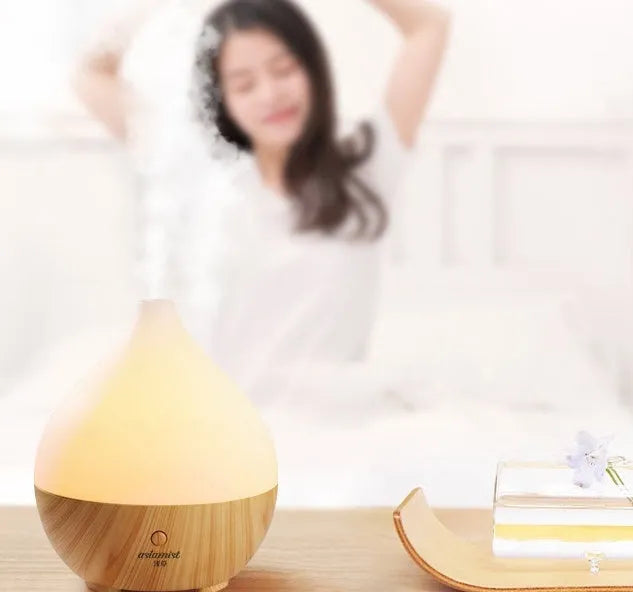 Asakusa wood grain finish vase-shaped 100ml USB aroma diffuser on a surface.