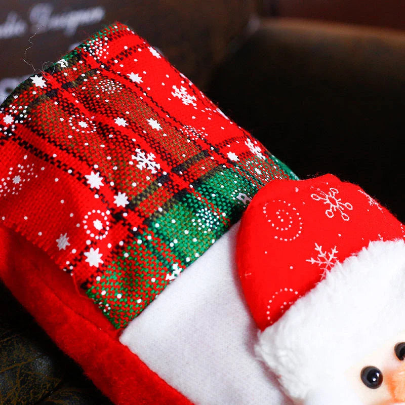 Colorful Christmas ornament-themed socks in a variety of designs, including an elk, bear, elderly person, and snowman.