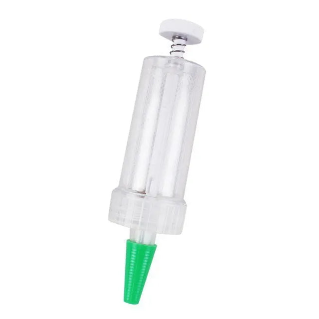 Green plastic mini garden seeder tool with adjustable thumb button, 12cm length