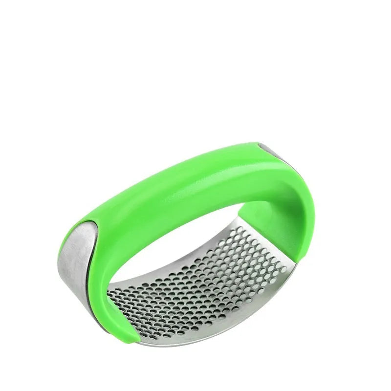 A stainless steel garlic press with a curved design and non-slip ergonomic handle.