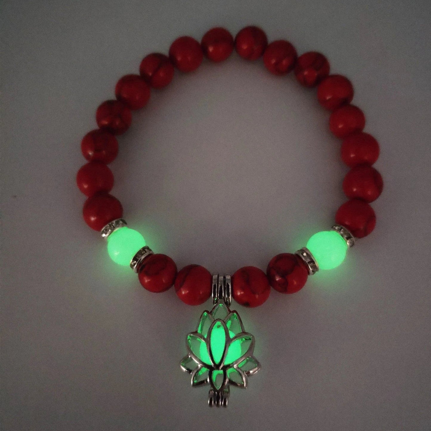 Luminous lotus charm bracelet with mesmerizing glow-in-the-dark beads, made of premium alloy and turquoise fluorescent stone