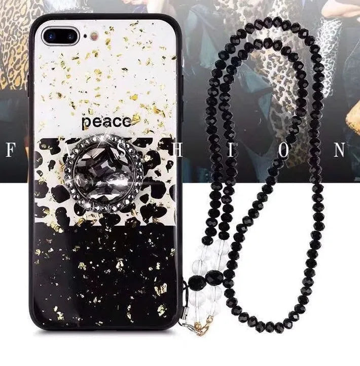 Leopard print pattern TPU back cover case for a mobile phone on a table.