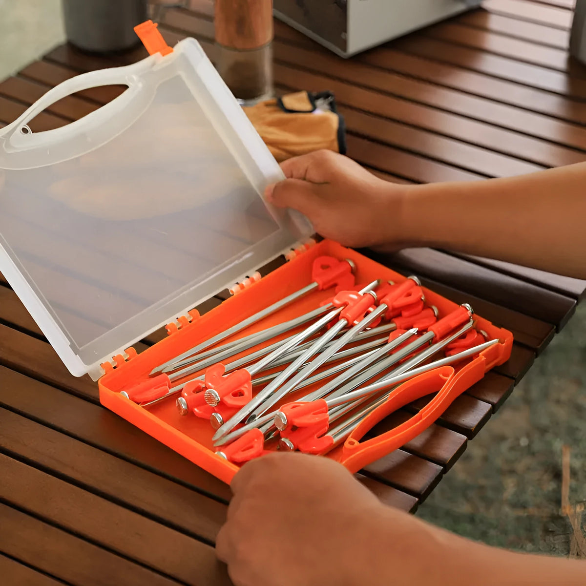 Boxed orange plastic tent stakes with small flat heads, 6.5x20.5mm, for outdoor camping ground fixing