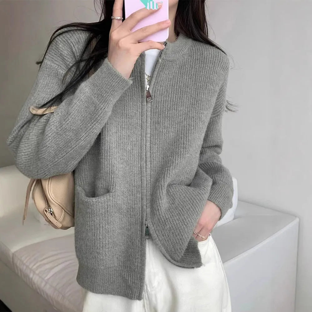 Beige long sleeve cardigan-style sweater coat made from soft viscose fibre fabric.
