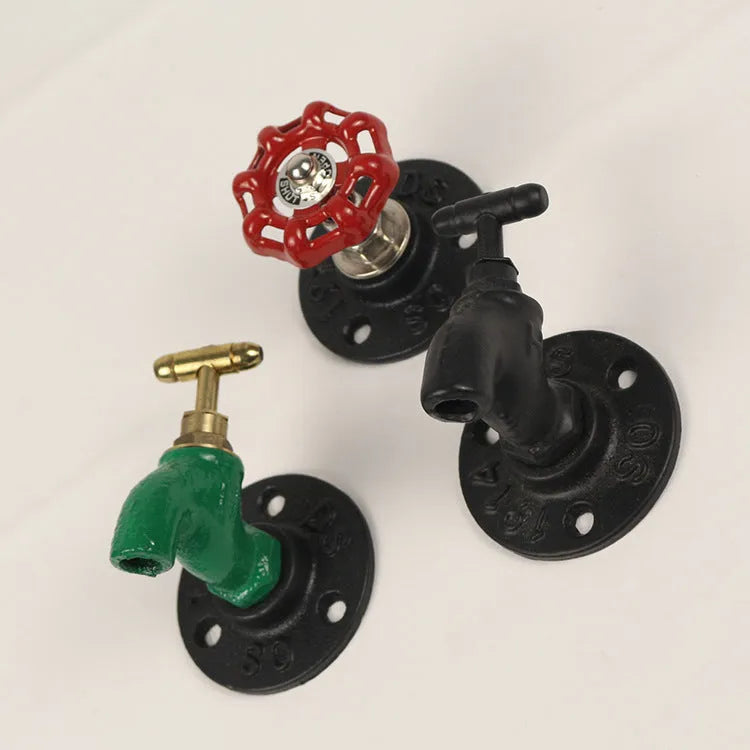 Metal water pipe style wall hook for towels in black, green, or red with a polished finish
