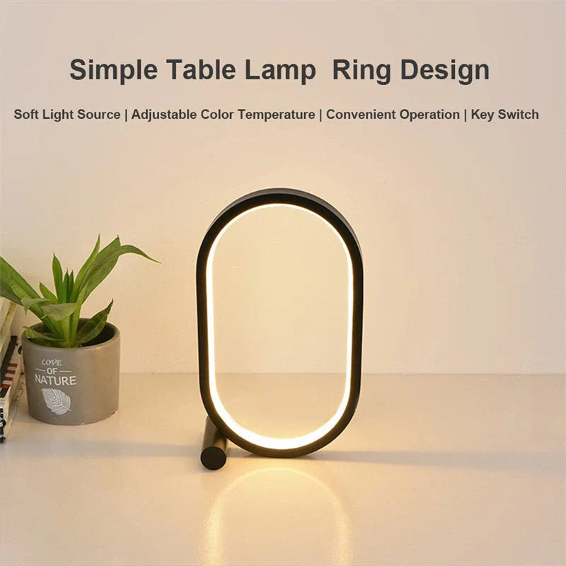 Oval acrylic desk lamp with touch controls, USB charging, and energy-efficient LED lighting