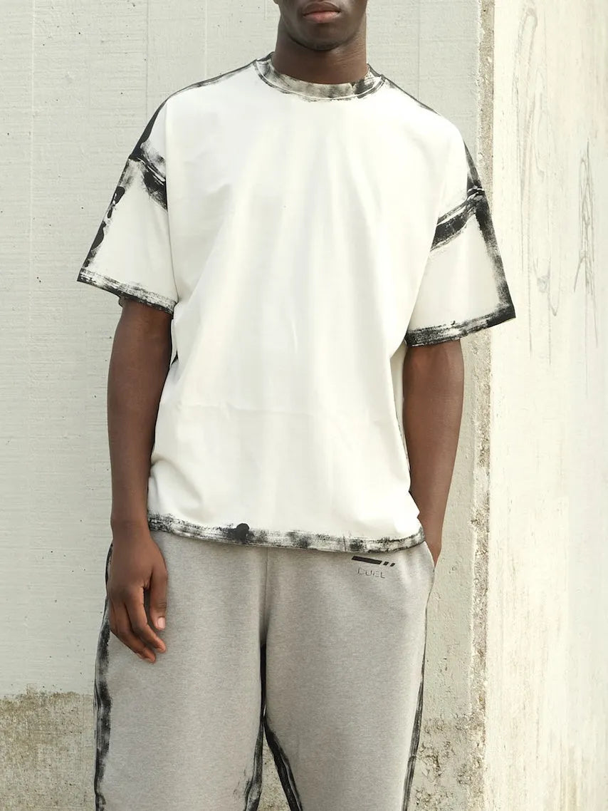 White casual short sleeve top with draped design and printed details