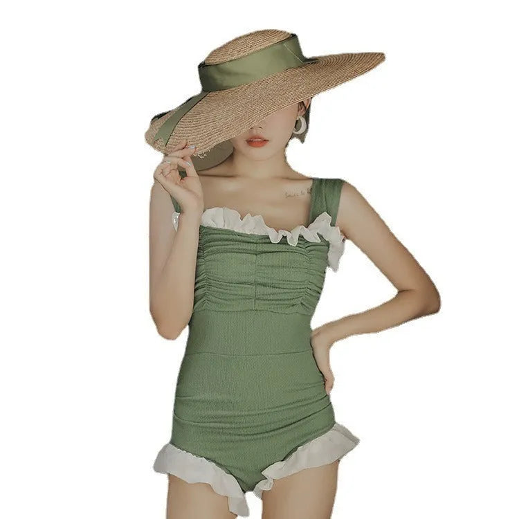 Korean style triangle top one-piece swimsuit for women with high waist in black colour.