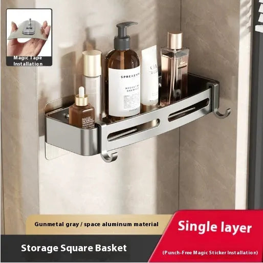 Gun grey wall-mounted corner bathroom storage rack with a single shelf, shown in a shower.