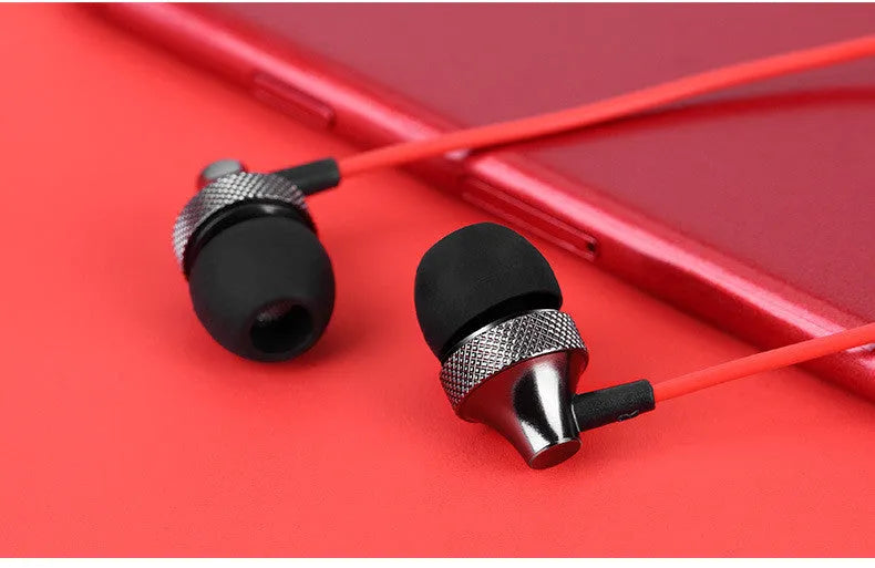 Metal in-ear headphones with wheat-coloured cable and 3.5mm plug in gold, silver, black, and red/black colours.
