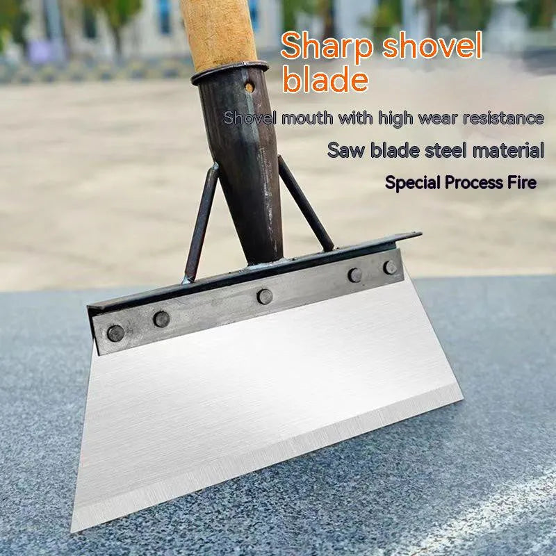 Manganese steel cleaning shovel with a long handle, shown in a garden setting.