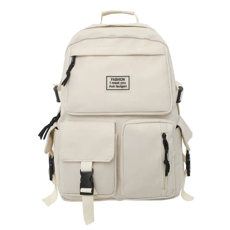 Black or white nylon student backpack with computer compartment measuring 31x12x41cm
