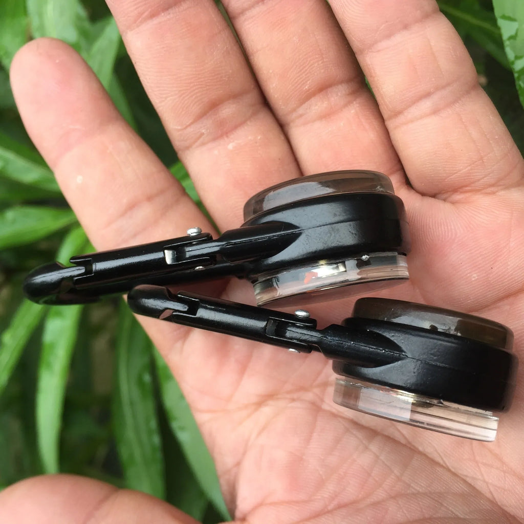 Black army green rose gold zinc alloy carabiner with thermometer and compass, showing double-sided climbing button.