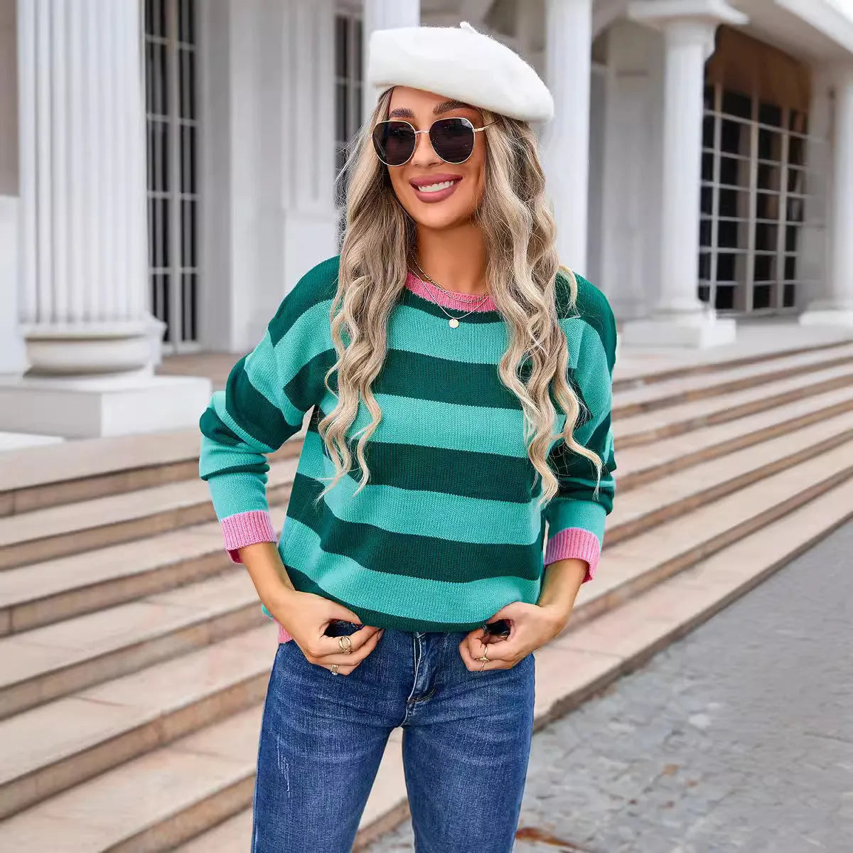 Women's loose long sleeve acrylic sweater in blue with a stripe pattern